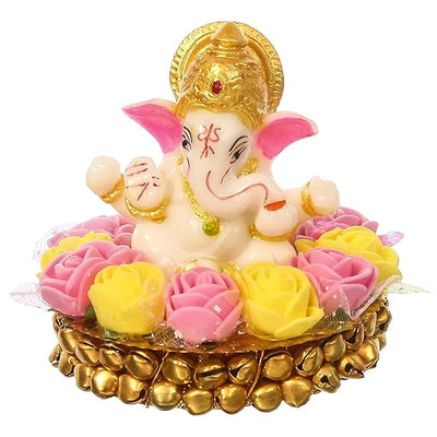 Handcrafted Lord Ganesha idol made of vibrant resin, measuring 8x8x8 cm, symbolizing prosperity and wisdom, placed on a decorative plate.