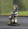 A beautifully crafted resin idol of Lord Hanumanji, showcasing intricate details and vibrant colors, ideal for home altars or car dashboards.