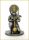 A beautifully crafted resin idol of Lord Hanumanji, showcasing intricate details and vibrant colors, ideal for home altars or car dashboards.