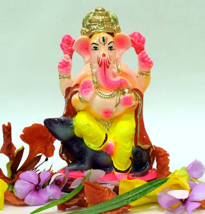Eco-friendly water-soluble Ganesha idol made from natural clay, perfect for Ganesh Chaturthi celebrations, featuring vibrant colors and traditional design.