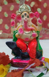 Eco-friendly water-soluble Ganesha idol made from natural clay, perfect for Ganesh Chaturthi celebrations, featuring vibrant colors and traditional design.