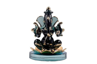 Elegant handmade glass Ganesha idol, weighing 450g, ideal for altars or car dashboards, showcasing intricate craftsmanship and divine beauty