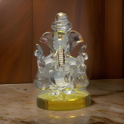 Elegant handmade resin Ganesha idol with a crystal finish, perfect for enhancing office and car dashboard decor, symbolizing wisdom and prosperity."