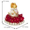 Elegant Lord Ganesha idol made of resin, measuring 8.9 cm x 8.9 cm x 8.9 cm, symbolizing prosperity and wisdom, ideal for home and car decor.