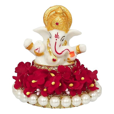 Elegant Lord Ganesha idol made of resin, measuring 8.9 cm x 8.9 cm x 8.9 cm, symbolizing prosperity and wisdom, ideal for home and car decor.