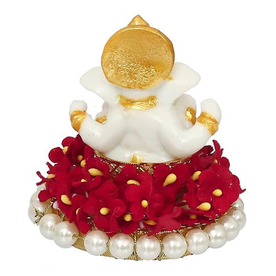 Elegant Lord Ganesha idol made of resin, measuring 8.9 cm x 8.9 cm x 8.9 cm, symbolizing prosperity and wisdom, ideal for home and car decor.