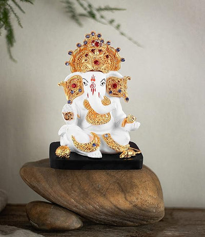 Handcrafted marble Ganesha statue (10.1 x 7 x 5 cm) symbolizing wisdom and prosperity, perfect for home altar or office desk.