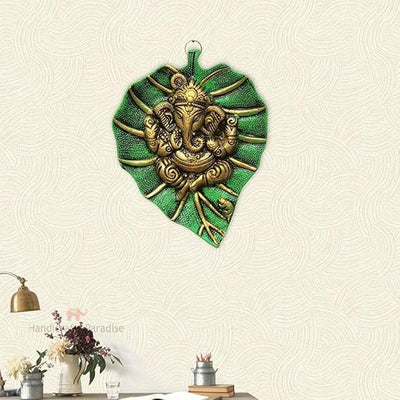 Handmade Ganesha wall hanging in aluminum, symbolizing wisdom and prosperity, perfect for home decor and altars.