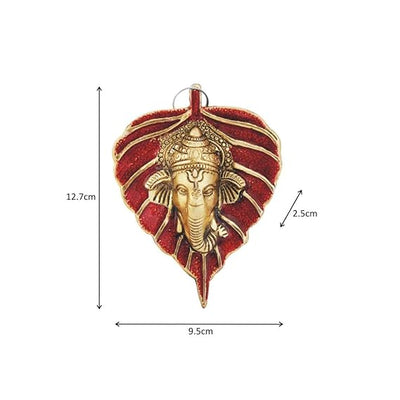 Handmade Ganesha wall hanging in aluminum, symbolizing wisdom and prosperity, ideal for home decor and spiritual spaces.