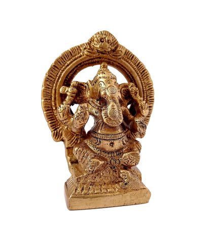 Handmade Ganesha showpiece in brass, symbolizing wisdom and prosperity, perfect for home altars and decorative spaces.