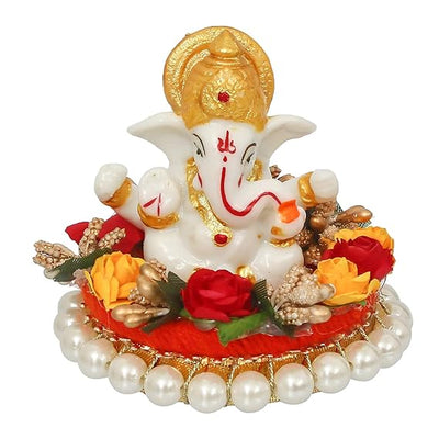 Handmade Lord Ganesha idol on a decorative plate, crafted from resin. Dimensions 8.9x8.9x7.6 cm, weighing 400g. Ideal for home decor and gifting.