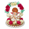 Handmade Lord Ganesha idol on a floral throne, crafted from resin. Dimensions: 9x9x9.5 cm, weight: 250g. Ideal for home decor and gifting.