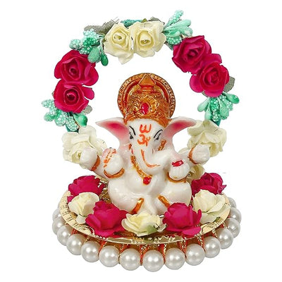 Handmade Lord Ganesha idol on a floral throne, crafted from resin. Dimensions: 9x9x9.5 cm, weight: 250g. Ideal for home decor and gifting.