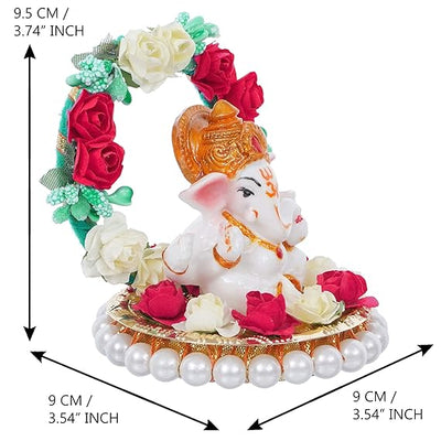 Handmade Lord Ganesha idol on a floral throne, crafted from resin. Dimensions: 9x9x9.5 cm, weight: 250g. Ideal for home decor and gifting.