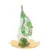 A handmade glass Ganesha idol, 4.5 cm x 6 cm, designed for car dashboards, showcasing intricate detailing and a spiritual aura.