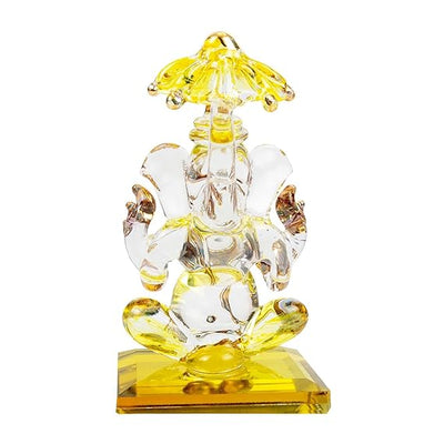A beautiful handcrafted glass Ganesha idol, measuring 5 cm x 5 cm x 9 cm, ideal for car dashboards or home altars