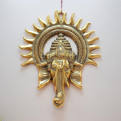 Handmade Ganesha metal wall hanging, symbolizing wisdom and prosperity, perfect for home decor and spiritual spaces.