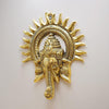 Handmade Ganesha metal wall hanging, symbolizing wisdom and prosperity, perfect for home decor and spiritual spaces.