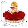 Handmade Lord Ganesha idol on a vibrant red floral plate, crafted from resin. Dimensions: 9x9x8 cm, weight: 250g. Ideal for home decor and gifting.