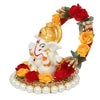 Handmade Lord Ganesha idol on a handcrafted rose flower plate, made of resin. Dimensions 10x8x8 cm, weighing 300g. Ideal for home decor and gifting.