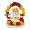 Handmade Lord Ganesha idol on a handcrafted rose flower plate, made of resin. Dimensions 10x8x8 cm, weighing 300g. Ideal for home decor and gifting.
