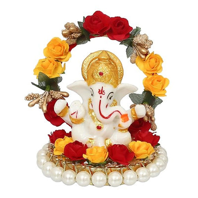 Handmade Lord Ganesha idol on a handcrafted rose flower plate, made of resin. Dimensions 10x8x8 cm, weighing 300g. Ideal for home decor and gifting.