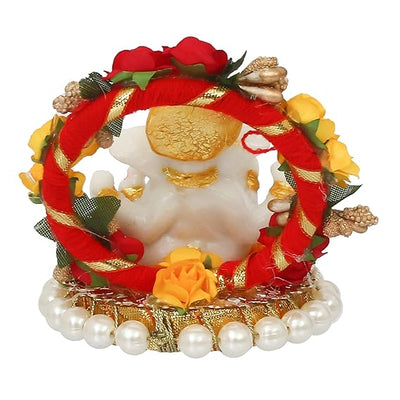 Handmade Lord Ganesha idol on a handcrafted rose flower plate, made of resin. Dimensions 10x8x8 cm, weighing 300g. Ideal for home decor and gifting.