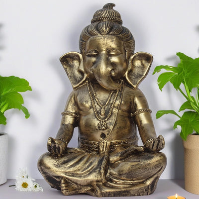 Handmade Ganesha idol showpiece in resin, symbolizing wisdom and prosperity, perfect for home decor and altars.