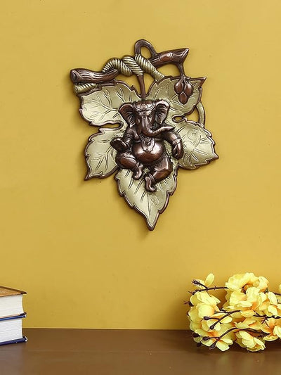 Handmade Ganesha wall hanging idol in iron, symbolizing prosperity and wisdom, perfect for home decor and altars.
