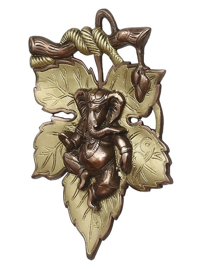 Handmade Ganesha wall hanging idol in iron, symbolizing prosperity and wisdom, perfect for home decor and altars.