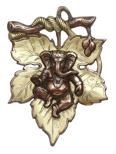 Handmade Ganesha wall hanging idol in iron, symbolizing prosperity and wisdom, perfect for home decor and altars.