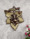 Handmade Ganesha wall hanging idol in iron, symbolizing prosperity and wisdom, perfect for home decor and altars.
