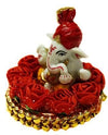 Handmade 300g resin Ganesha idol, intricately designed, perfect for car dashboard or home altar, measuring 9 cm x 9 cm x 9 cm.