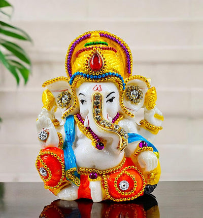 A beautifully crafted 600-gram resin Ganesha idol, showcasing intricate details, perfect for your altar or car dashboard