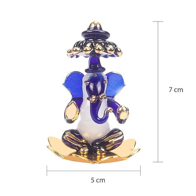A beautifully crafted glass Ganesha idol, showcasing intricate details, ideal for home decor or car dashboards.
