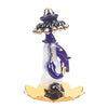 A beautifully crafted glass Ganesha idol, showcasing intricate details, ideal for home decor or car dashboards.
