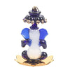 A beautifully crafted glass Ganesha idol, showcasing intricate details, ideal for home decor or car dashboards.