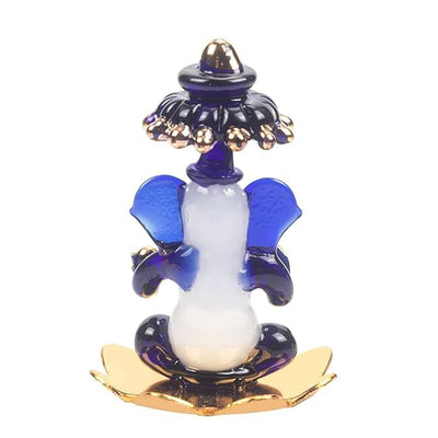 A beautifully crafted glass Ganesha idol, showcasing intricate details, ideal for home decor or car dashboards.