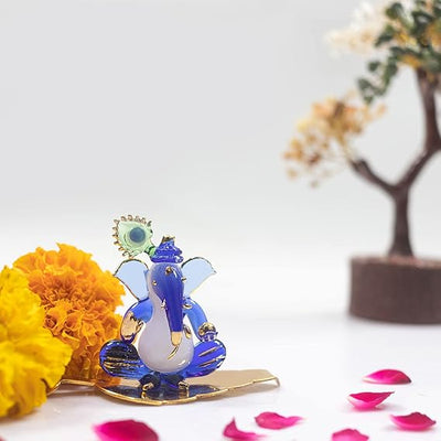 Handcrafted Glass Ganesha Idol, 300 grams, perfect for car dashboard or home altar, measuring 8.5 cm x 6.5 cm x 6.5 cm