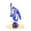 A beautifully crafted glass Ganesha idol, showcasing intricate details, perfect for car dashboards or as a decorative showpiece