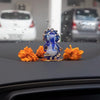 A beautifully crafted glass Ganesha idol, showcasing intricate details, perfect for car dashboards or as a decorative showpiece