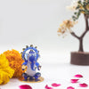 A beautifully crafted glass Ganesha idol, showcasing intricate details, perfect for car dashboards or as a decorative showpiece