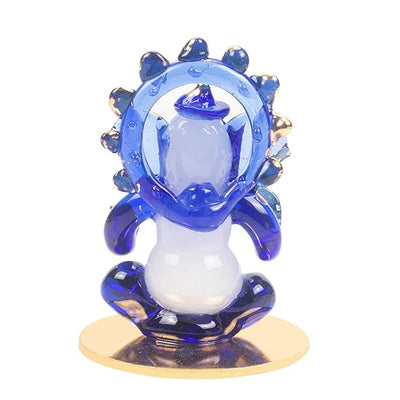 A beautifully crafted glass Ganesha idol, showcasing intricate details, perfect for car dashboards or as a decorative showpiece