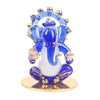 A beautifully crafted glass Ganesha idol, showcasing intricate details, perfect for car dashboards or as a decorative showpiece