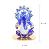A beautifully crafted glass Ganesha idol, showcasing intricate details, perfect for car dashboards or as a decorative showpiece