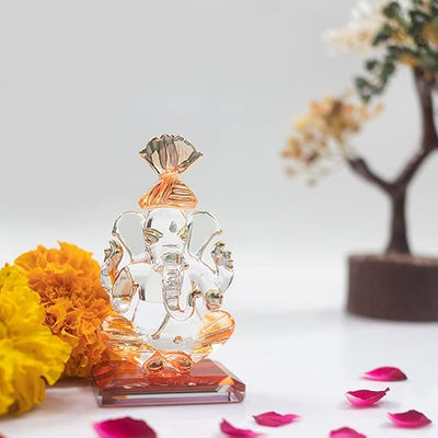 Handcrafted 300g Glass Ganesha Idol, 5cm x 5cm x 9cm, perfect for car dashboard or home décor, showcasing intricate details and spiritual charm.