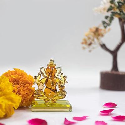 Handmade glass Ganesha statue, 6.5x5 cm, ideal for car dashboard or home altar. Symbolizes wisdom, success, and divine blessings