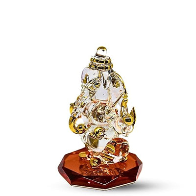 Handcrafted glass Ganesha statue, 8x5 cm, perfect for car dashboard or home altar. Symbolizes wisdom, prosperity, and divine blessings.