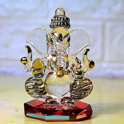 Handcrafted glass Ganesha statue, 8x5 cm, perfect for car dashboard or home altar. Symbolizes wisdom, prosperity, and divine blessings.
