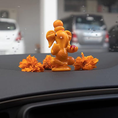 Handmade glass Ganesha statue, 8x5 cm, ideal for car dashboard or home altar. Symbolizes wisdom, success, and divine blessings.